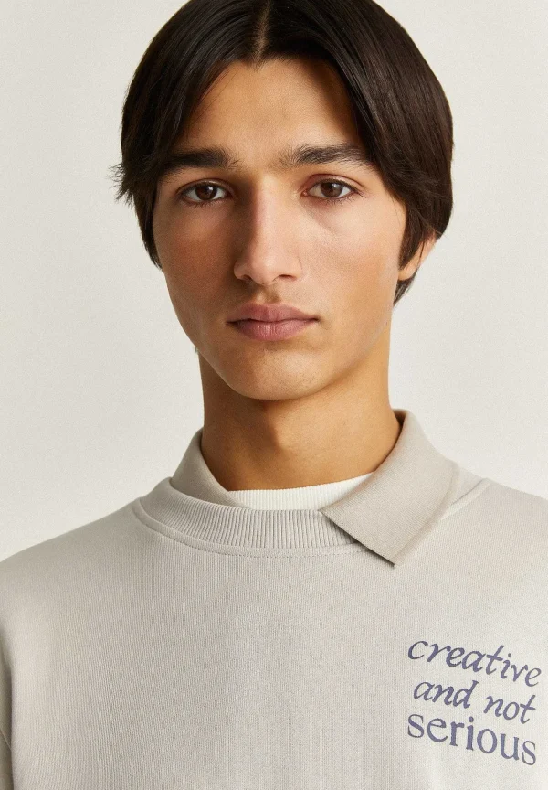 Store Scalpers Sudadera Print Contraste